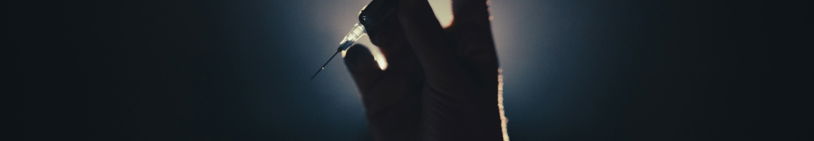 a person holding a light saber